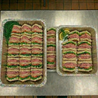 Roast beef and cheese sandwich catering trays with mayo, lettuce, and tomato from Ally’s Comfort Café in Davie, FL